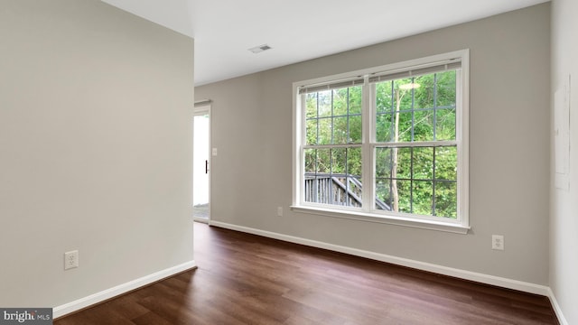 19645 Point Lookout Rd, Lexington Park, MD 20653 - empty room with baseboards and dark wood finished floors