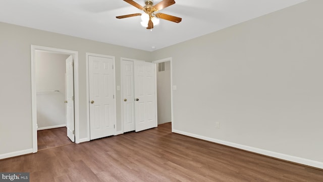 19645 Point Lookout Rd, Lexington Park, MD 20653 - unfurnished bedroom featuring wood finished floors, baseboards, and ceiling fan