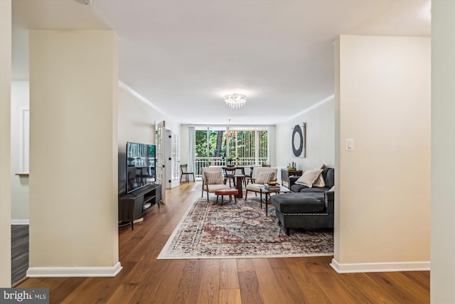 4100 Cathedral Ave NW Unit 818, Washington, DC 20016 - living area featuring baseboards, wood finished floors, ornamental molding, and floor to ceiling windows