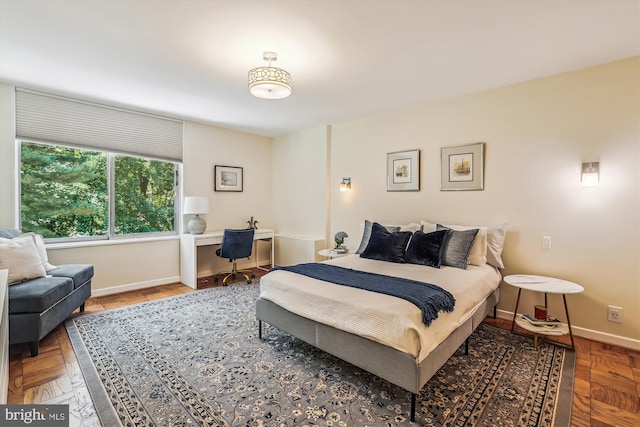 4100 Cathedral Ave NW Unit 818, Washington, DC 20016 - bedroom with a desk and baseboards