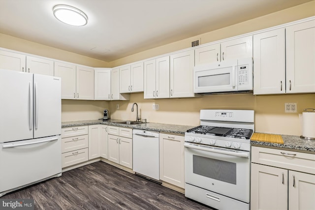 4100 Cathedral Ave NW Unit 818, Washington, DC 20016 - kitchen with white appliances, a sink, and white cabinetry