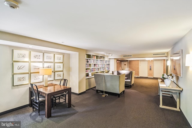 4100 Cathedral Ave NW Unit 818, Washington, DC 20016 - living room with baseboards and dark carpet
