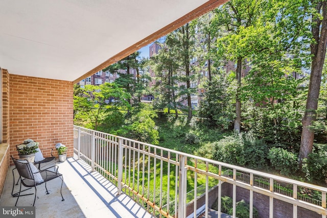 4100 Cathedral Ave NW Unit 818, Washington, DC 20016 - balcony featuring view of scattered trees