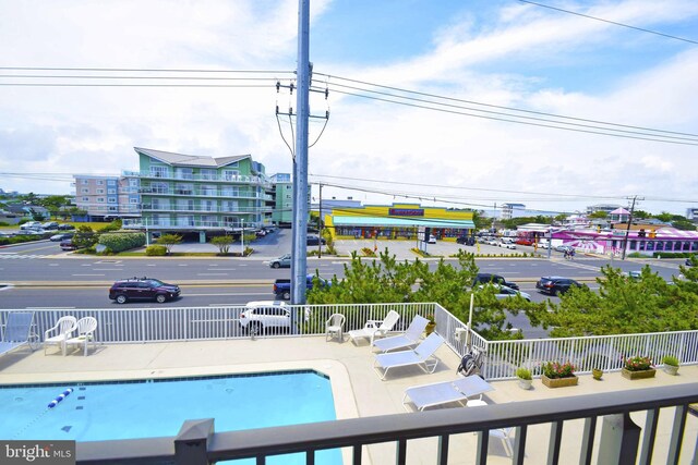 7604 Coastal Hwy Unit 2B, Ocean City, MD 21842 - community pool with fence and a patio area