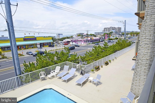 7604 Coastal Hwy Unit 2B, Ocean City, MD 21842 - community pool with fence and a patio area