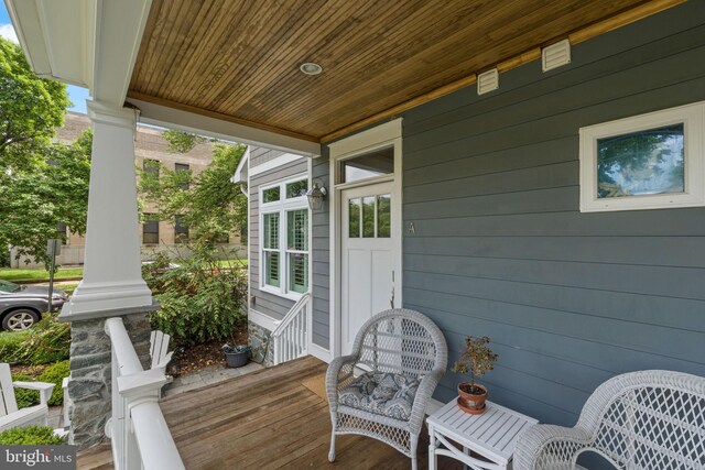 view of patio featuring a porch