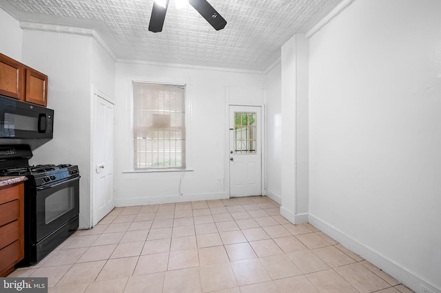 2717 Mosher St, Baltimore, MD 21216 - kitchen featuring black appliances, ceiling fan, brown cabinets, light tile patterned floors, and baseboards