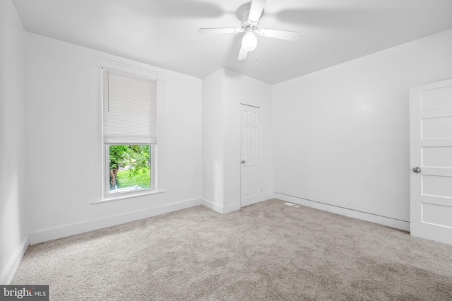 2717 Mosher St, Baltimore, MD 21216 - spare room featuring a ceiling fan, carpet floors, and baseboards