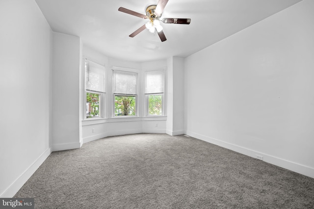 2717 Mosher St, Baltimore, MD 21216 - spare room with carpet, ceiling fan, and baseboards