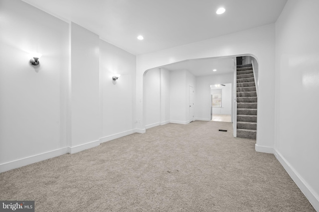 2717 Mosher St, Baltimore, MD 21216 - carpeted spare room featuring arched walkways, recessed lighting, stairway, and baseboards