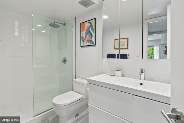2141 Wisconsin Ave NW Unit 103, Washington, DC 20007 - bathroom featuring toilet, walk in shower, and vanity