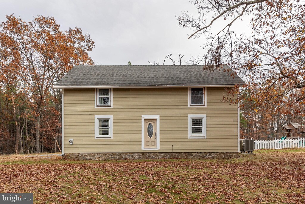 136 Nelsons Chapel Ln, Cross Junction, VA 22625 - view of front of house with cooling unit and roof with shingles