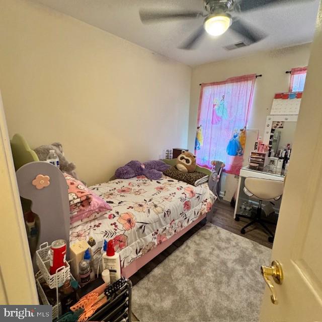 9330 China Grove Ct, Manassas, VA 20110 - bedroom featuring a ceiling fan and wood finished floors