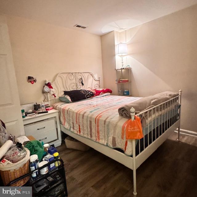 9330 China Grove Ct, Manassas, VA 20110 - bedroom featuring wood finished floors