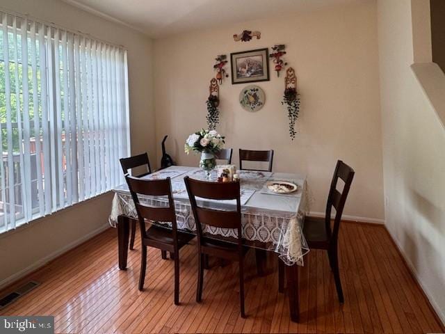 9330 China Grove Ct, Manassas, VA 20110 - dining space featuring light wood-type flooring and baseboards