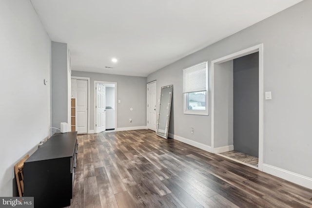 321 Taft St, Bristol, PA 19007 - unfurnished bedroom with washer / dryer, wood finished floors, baseboards, and recessed lighting