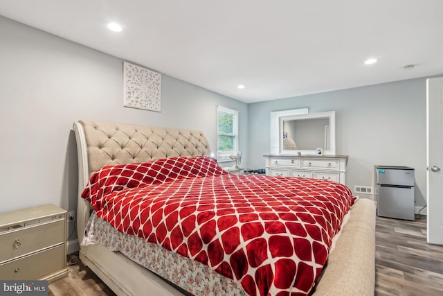 321 Taft St, Bristol, PA 19007 - bedroom featuring freestanding refrigerator, wood finished floors, and recessed lighting