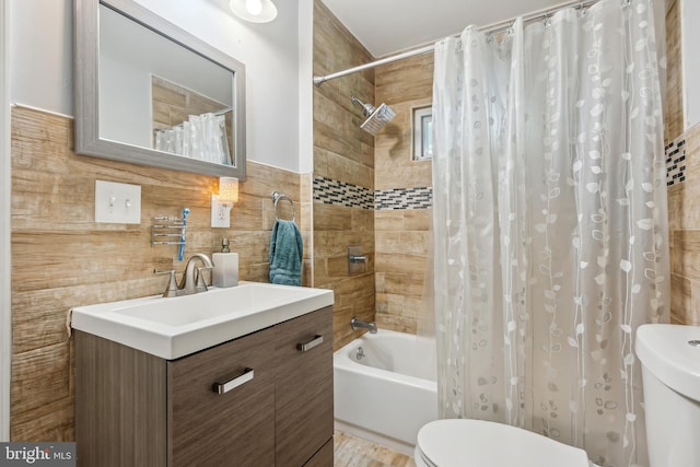 321 Taft St, Bristol, PA 19007 - full bath with toilet, shower / bath combo, vanity, and tile walls