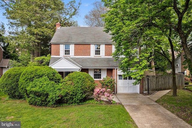 812 Pleasant Hill Rd, Wallingford, PA 19086 - view of front of home featuring brick siding, driveway, a chimney, an attached garage, and a shingled roof