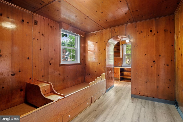 812 Pleasant Hill Rd, Wallingford, PA 19086 - hallway with wood ceiling, wood finished floors, wooden walls, and arched walkways