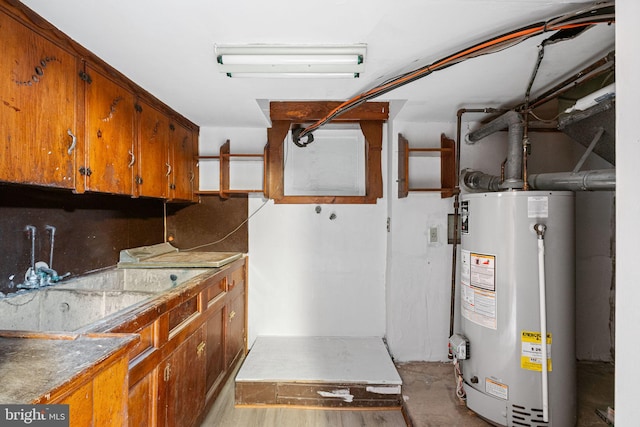 812 Pleasant Hill Rd, Wallingford, PA 19086 - basement featuring gas water heater and a sink