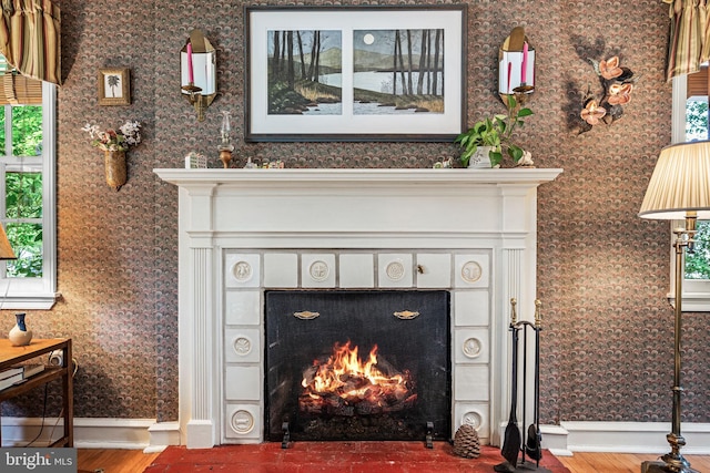 100 Chesney Ln, Erdenheim, PA 19038 - detailed view of a fireplace with flush hearth, wood finished floors, and baseboards
