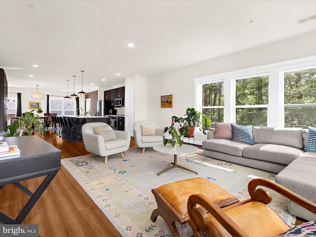 525 Leftwich Ln Unit 78, Annapolis, MD 21401 - living room with light wood-style floors, plenty of natural light, and recessed lighting
