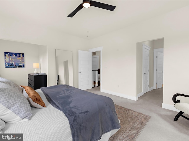 525 Leftwich Ln Unit 78, Annapolis, MD 21401 - bedroom with light colored carpet, baseboards, and ceiling fan
