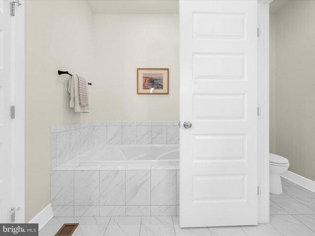 525 Leftwich Ln Unit 78, Annapolis, MD 21401 - full bath with a bath, toilet, baseboards, and marble finish floors