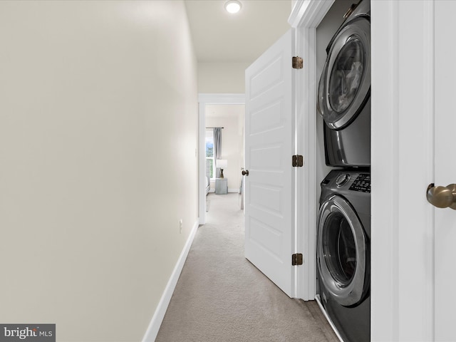 525 Leftwich Ln Unit 78, Annapolis, MD 21401 - washroom with stacked washer / dryer, carpet floors, baseboards, and recessed lighting