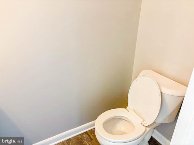 112 Hemlock Dr, Williamstown, NJ 08094 - bathroom with baseboards, toilet, and wood finished floors