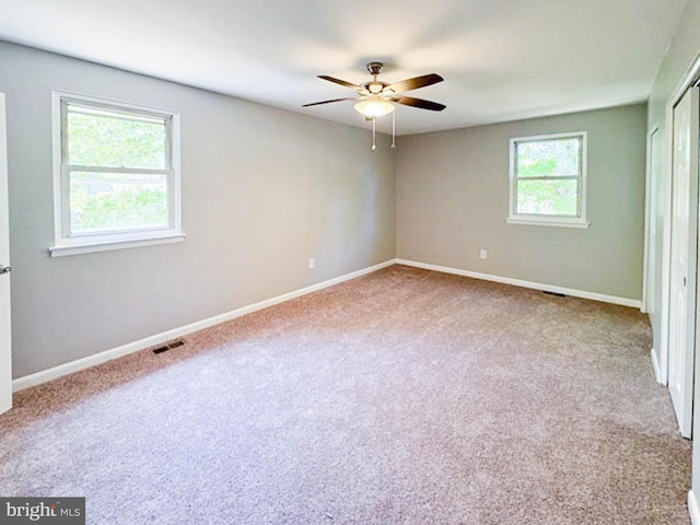 112 Hemlock Dr, Williamstown, NJ 08094 - unfurnished bedroom with carpet, baseboards, a closet, and a ceiling fan