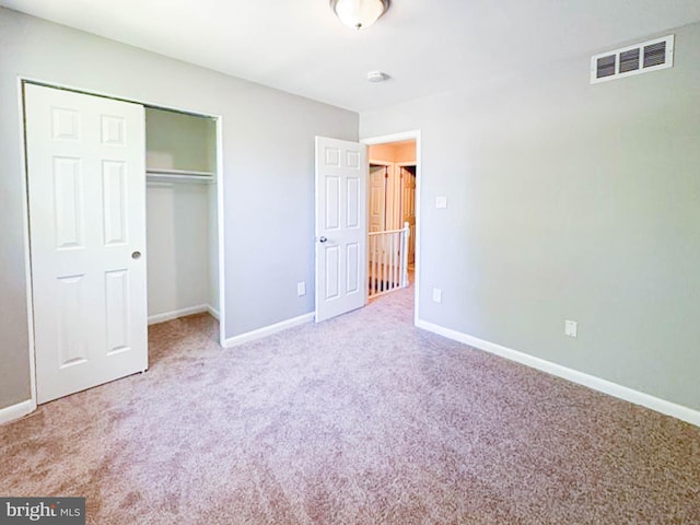 112 Hemlock Dr, Williamstown, NJ 08094 - unfurnished bedroom featuring carpet, baseboards, and a closet
