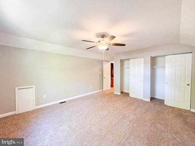 112 Hemlock Dr, Williamstown, NJ 08094 - unfurnished bedroom with multiple closets, carpet floors, baseboards, and ceiling fan
