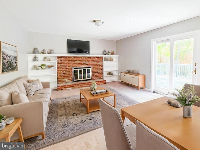 112 Hemlock Dr, Williamstown, NJ 08094 - living room featuring light carpet and a brick fireplace