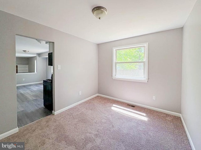 112 Hemlock Dr, Williamstown, NJ 08094 - empty room featuring carpet floors and baseboards