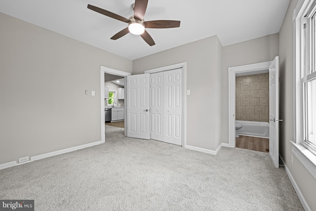 10 E Chestnut St, Delmar, MD 21875 - unfurnished bedroom featuring carpet flooring, baseboards, a closet, ceiling fan, and a sink