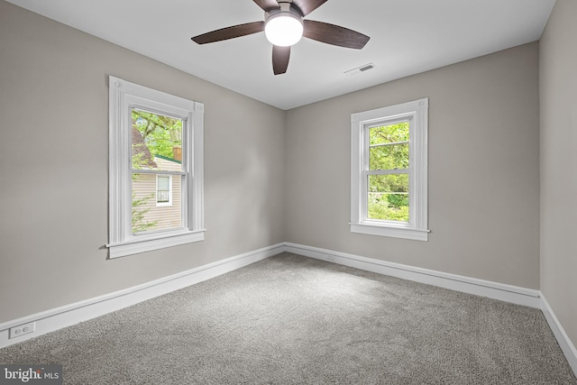 10 E Chestnut St, Delmar, MD 21875 - empty room featuring carpet floors, baseboards, and a ceiling fan
