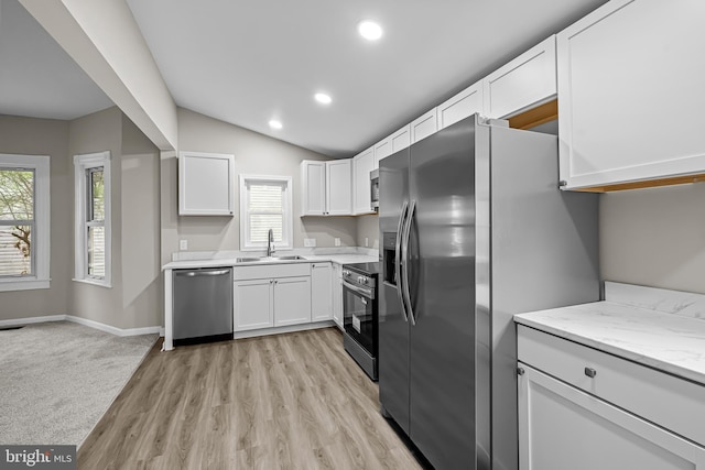 10 E Chestnut St, Delmar, MD 21875 - kitchen with appliances with stainless steel finishes, a sink, white cabinets, healthy amount of natural light, and recessed lighting