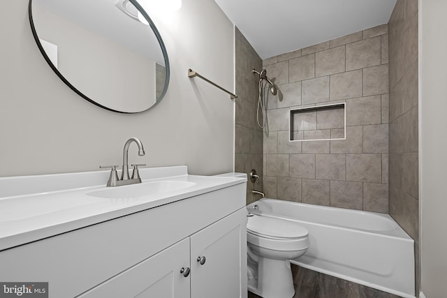 10 E Chestnut St, Delmar, MD 21875 - bathroom featuring toilet, wood finished floors, vanity, and shower / bath combination
