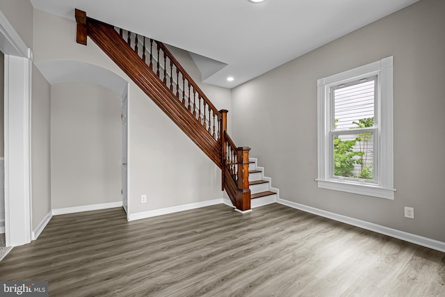10 E Chestnut St, Delmar, MD 21875 - unfurnished living room featuring wood finished floors, baseboards, recessed lighting, and stairway