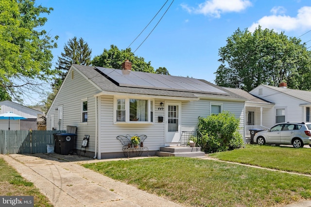 449 7th Ave, Lindenwold, NJ 08021 - bungalow-style house with solar panels, a chimney, and roof with shingles