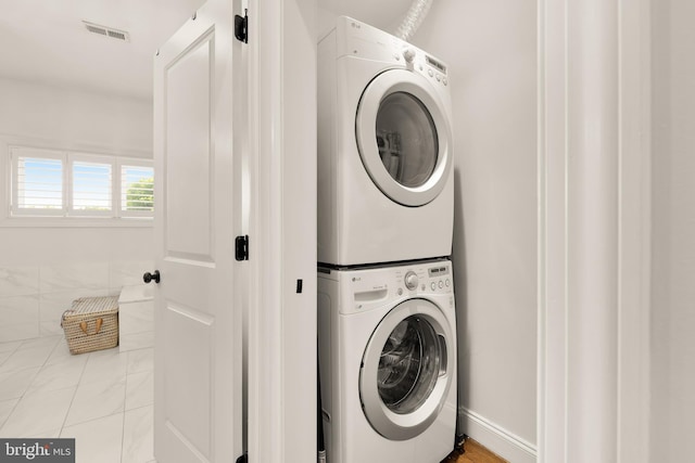 1323 S Carolina Ave SE, Washington, DC 20003 - washroom with stacked washer / drying machine