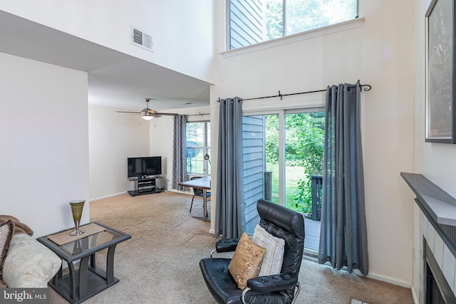 36F Needham Way, Princeton, NJ 08540 - carpeted living area with healthy amount of natural light, a high ceiling, and a ceiling fan