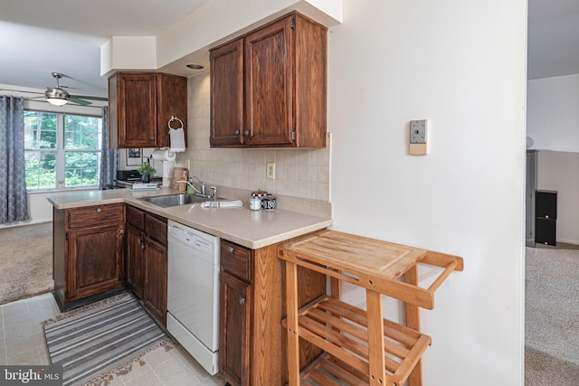36F Needham Way, Princeton, NJ 08540 - kitchen with white dishwasher, light countertops, ceiling fan, decorative backsplash, and light colored carpet