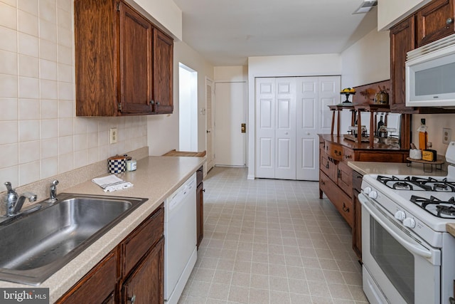 36F Needham Way, Princeton, NJ 08540 - kitchen featuring white appliances, light countertops, light flooring, and decorative backsplash