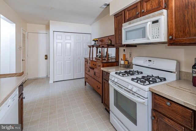 36F Needham Way, Princeton, NJ 08540 - kitchen with white appliances and light countertops