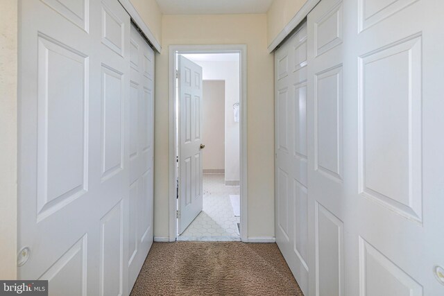 36F Needham Way, Princeton, NJ 08540 - corridor with carpet flooring and tile patterned floors