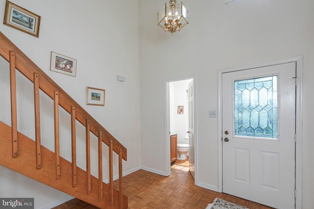 36F Needham Way, Princeton, NJ 08540 - foyer entrance with a high ceiling, a chandelier, and stairway