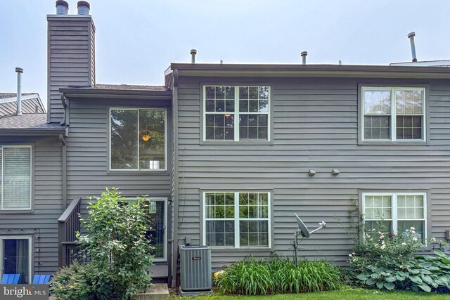 36F Needham Way, Princeton, NJ 08540 - rear view of property featuring a chimney